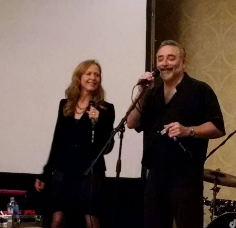 Kate White and Dr. Richard Loewenstein singing together at the 2015 Ivory Garden conference